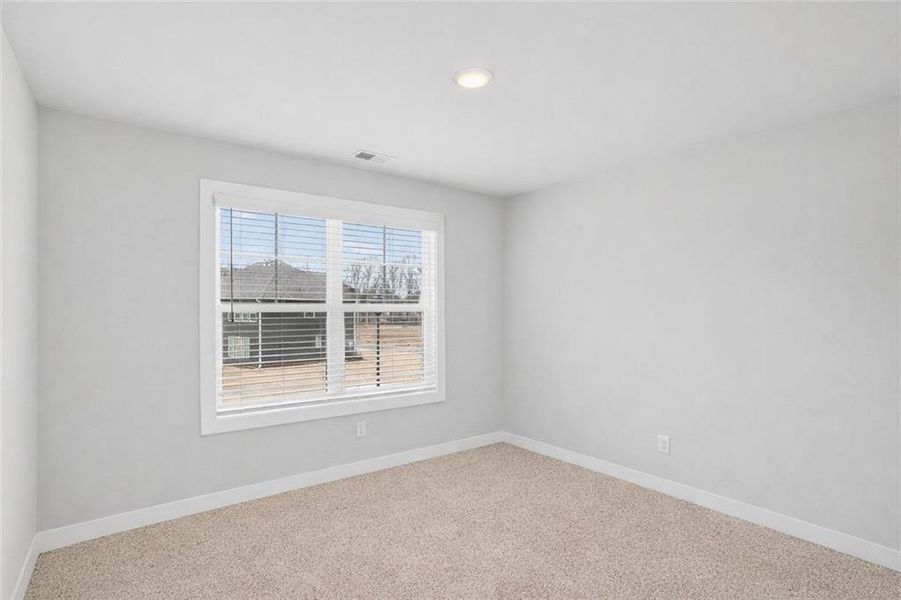 Spacious, unfurnished interior of a new home in The Fairways at Mirror Lake, Villa Rica (Image 14).