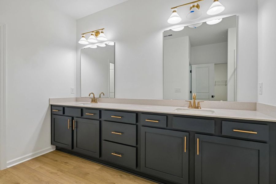 Primary Bath featuring the AW Collection® Sapphire - Clean white and cool hues define the space. Primary Bath featuring the AW Collection® Sapphire - Clean white and cool hues define the space.