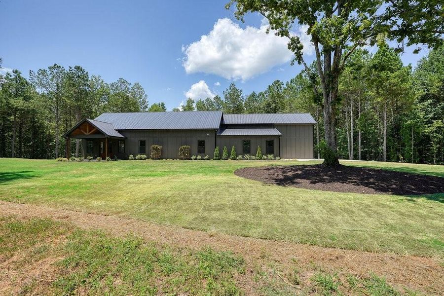 Front exterior of a new home in , Talking Rock, GA, highlighting curb appeal (Image 2). Front exterior of a new home in , Talking Rock, GA, highlighting curb appeal (Image 2).