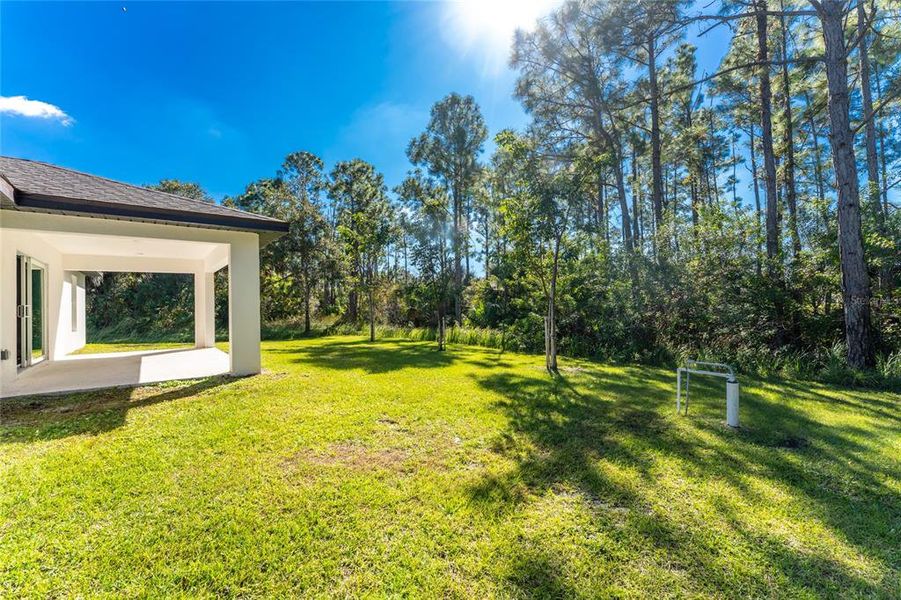 Exterior details and patio area of a home in , North Port (Image 28).