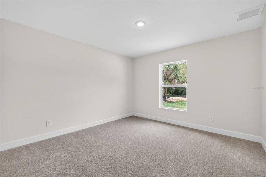 Spacious, unfurnished interior of a new home in , Port Charlotte (Image 18).