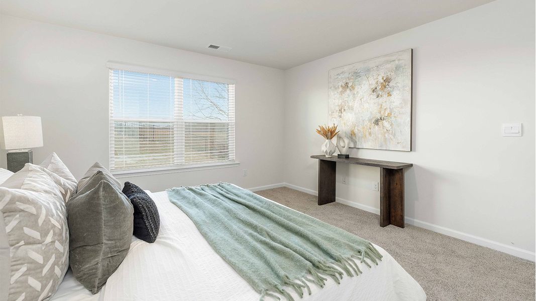Representative furnished interior of a home built from the Aria by D.R. Horton in Shepherd's Farm, Mooresville (Image 16).