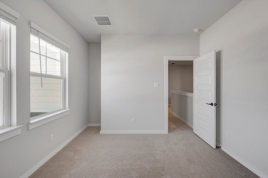 Spacious, unfurnished interior of a new home in Park Central, Georgetown (Image 37).