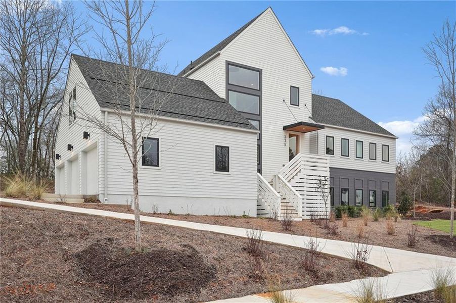 Front exterior of a new home in , Roswell, GA, highlighting curb appeal (Image 31).
