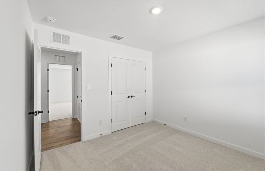 Spacious, unfurnished interior of a new home in Sunfield, Buda (Image 33). Spacious, unfurnished interior of a new home in Sunfield, Buda (Image 33).