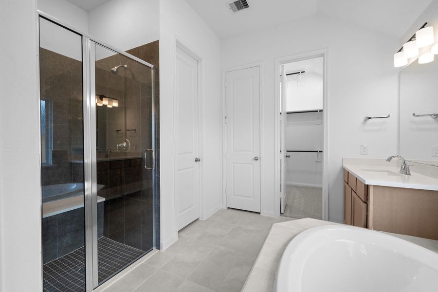 Furnished interior view inside a new home in Bridgeland, Cypress (Image 9).