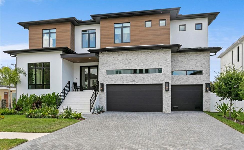 Front exterior of a new home in , Tampa, FL, highlighting curb appeal (Image 2). Front exterior of a new home in , Tampa, FL, highlighting curb appeal (Image 2).