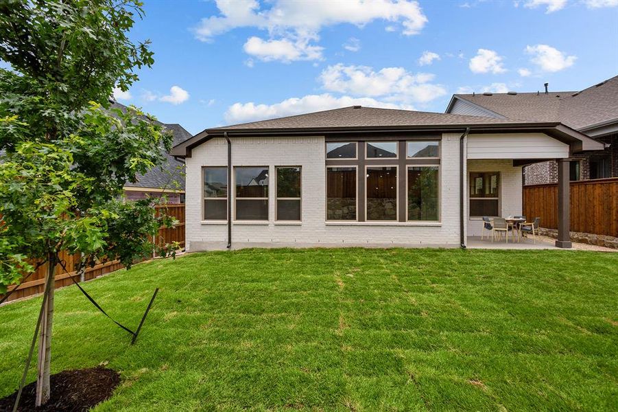 Front exterior of a new home in Walsh Classic, Aledo, TX, highlighting curb appeal (Image 2). Front exterior of a new home in Walsh Classic, Aledo, TX, highlighting curb appeal (Image 2).