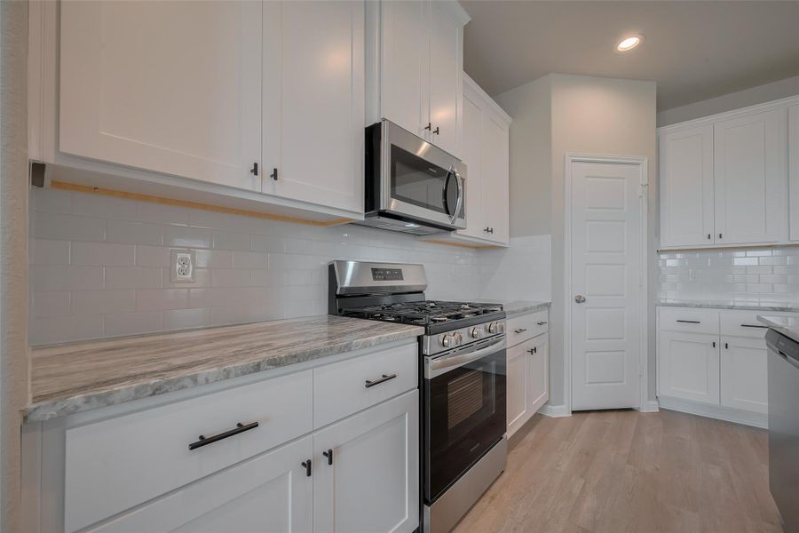 Furnished interior view inside a new home in La Segarra, Brookshire (Image 32). Furnished interior view inside a new home in La Segarra, Brookshire (Image 32).