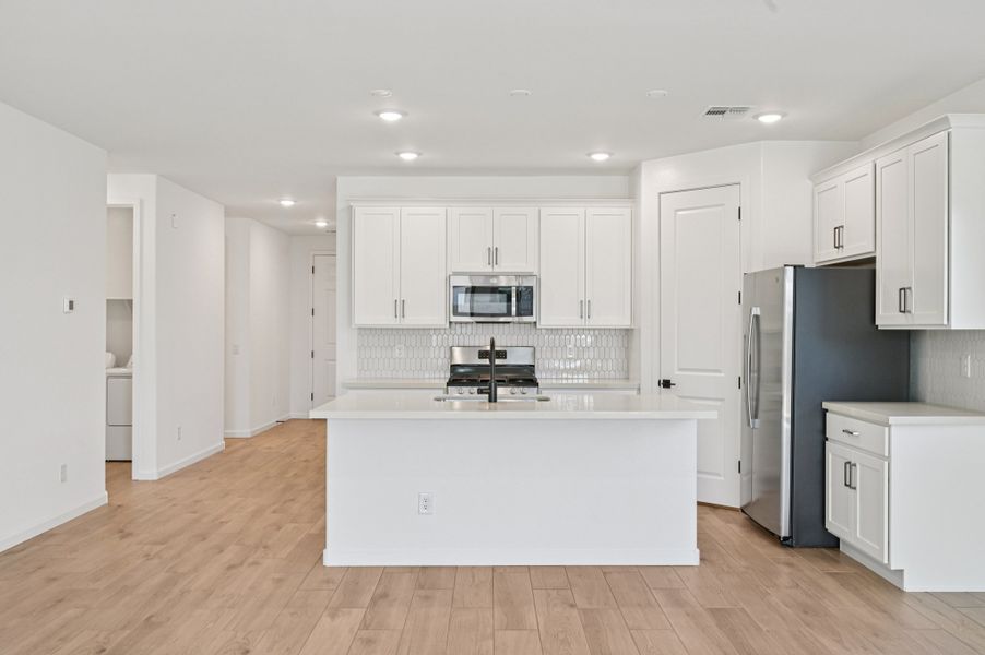 Kitchen featuring the Harmony Collection. Finishes and options may vary by community.