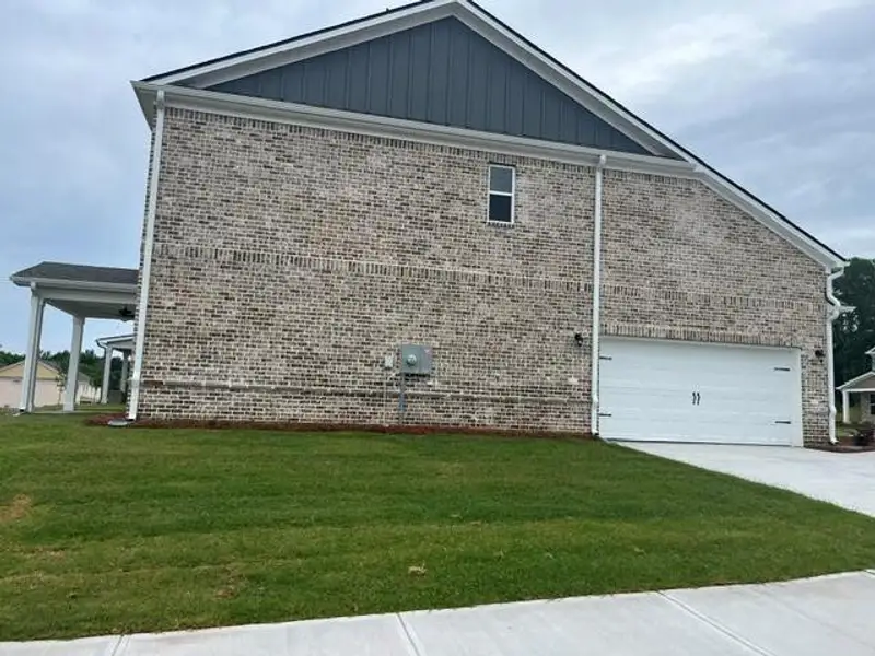 Exterior details and patio area of a home in Bowers Farm, McDonough (Image 22).