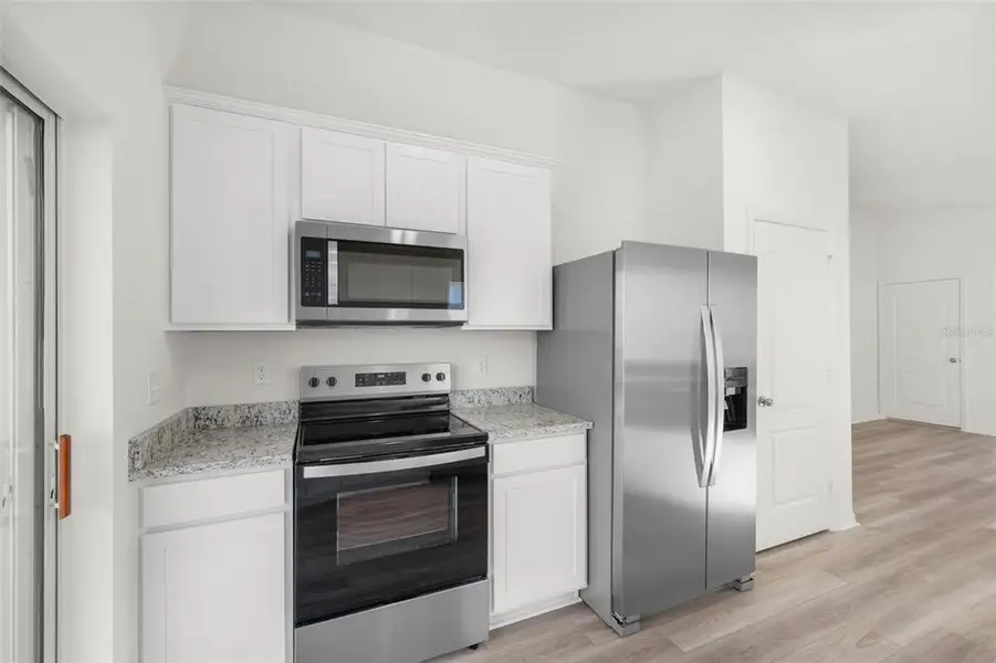 Furnished interior view inside a new home in Tula Parc, Astatula (Image 10). Furnished interior view inside a new home in Tula Parc, Astatula (Image 10).