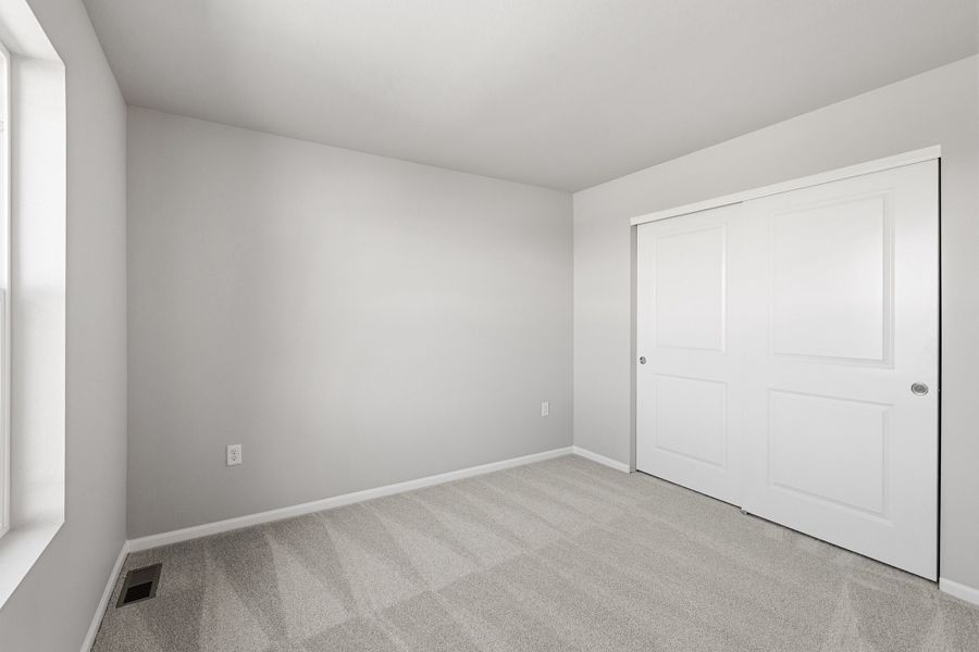Spacious, unfurnished interior of a new home in Talon Pointe, Thornton (Image 19).