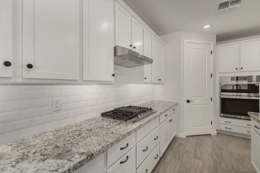 Furnished interior view inside a new home in Forté at Granite Vista, Waddell (Image 8).
