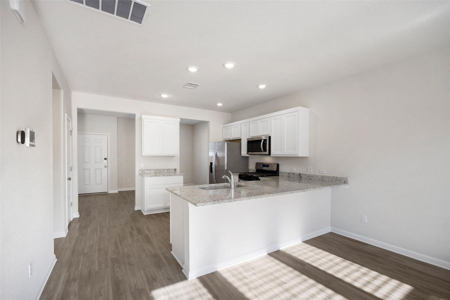 Furnished interior view inside a new home in Avery Centre, Round Rock (Image 10).