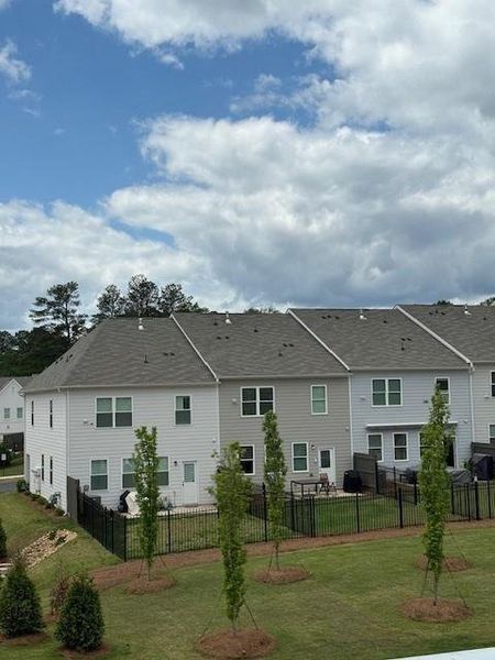 Front exterior of a new home in East Park Village, Kennesaw, GA, highlighting curb appeal (Image 27).