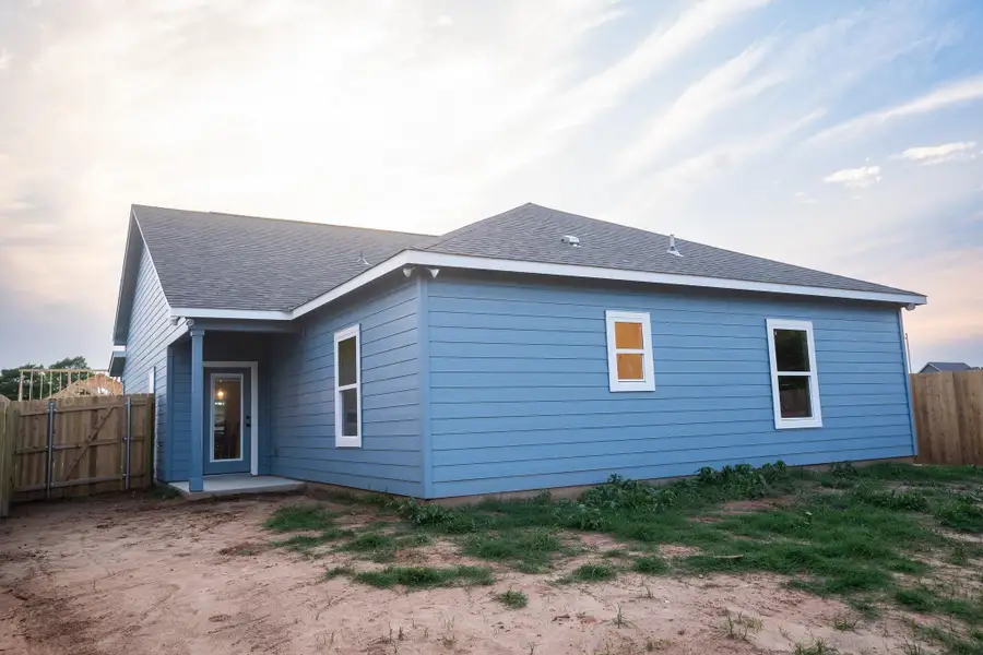View of home's exterior with roof with shingles View of home's exterior with roof with shingles