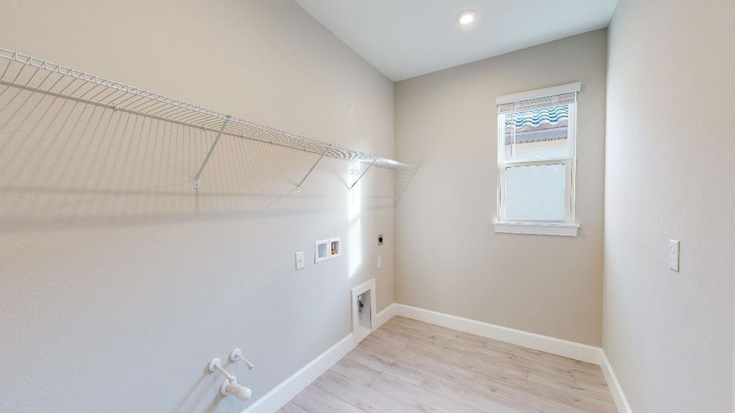 Representative unfurnished interior of a home built from the Azzurro by Taylor Morrison in Esplanade by the Islands, Naples (Image 25).