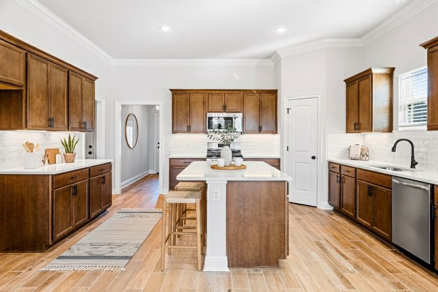 Front exterior of a new home in The Bluffs at Lafayette, Freeport, FL, highlighting curb appeal (Image 2).