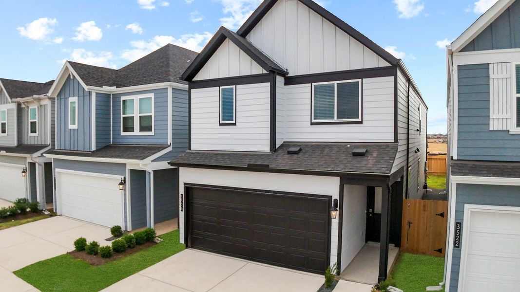 Front exterior of a new home in Villarosa at Tamarron, Katy, TX, highlighting curb appeal (Image 1). Front exterior of a new home in Villarosa at Tamarron, Katy, TX, highlighting curb appeal (Image 1).