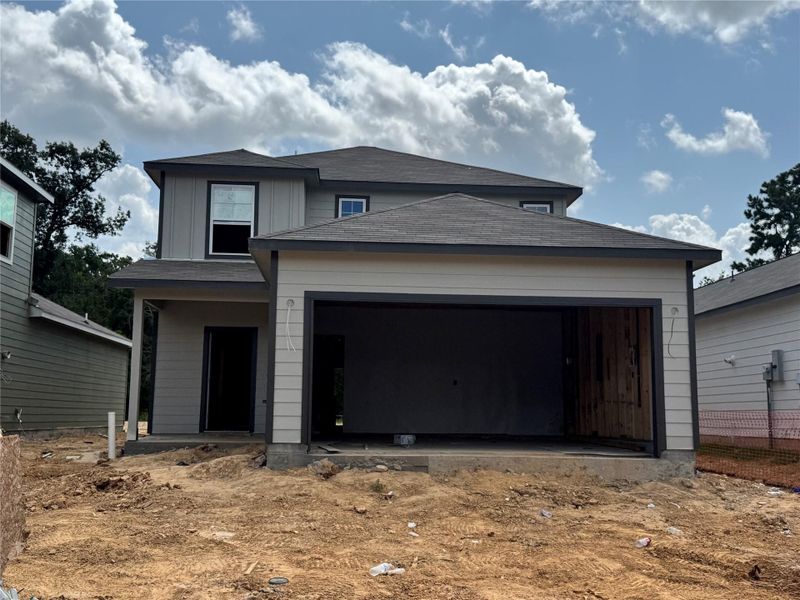 In-progress construction of a new home in Maple Heights, Porter, TX (Image 22).