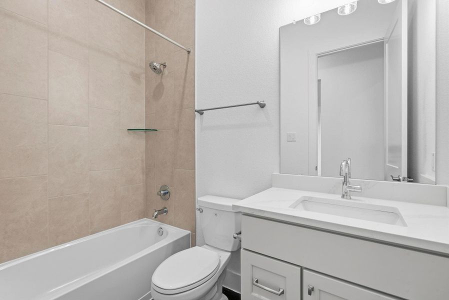 Furnished interior view inside a new home in Meridiana, Manvel (Image 10).