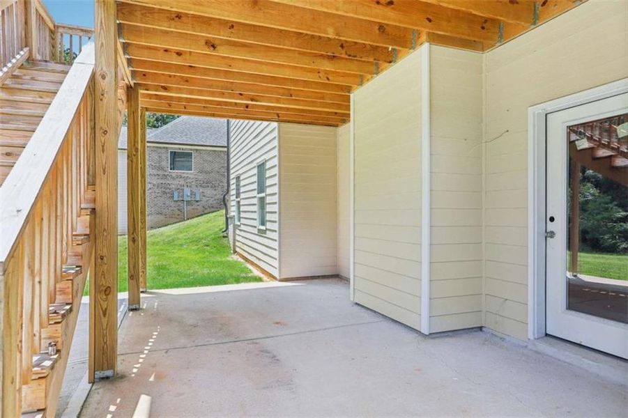 Exterior details and patio area of a home in Whitestone, Douglasville (Image 18).