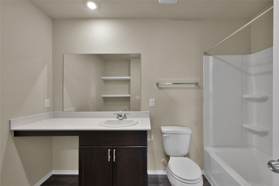 Furnished interior view inside a new home in Lakes at Black Oak, Magnolia (Image 11).