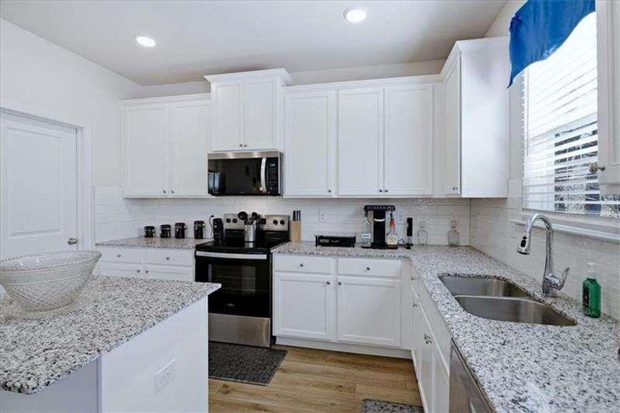 Furnished interior view inside a new home in Tell River, Atlanta (Image 7). Furnished interior view inside a new home in Tell River, Atlanta (Image 7).