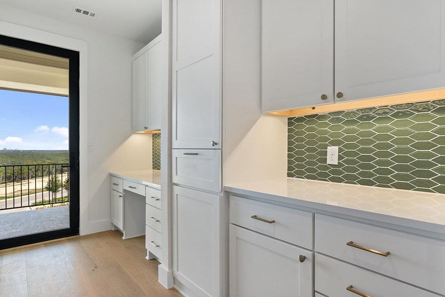 Furnished interior view inside a new home in Milky Way at River Place, Austin (Image 13).