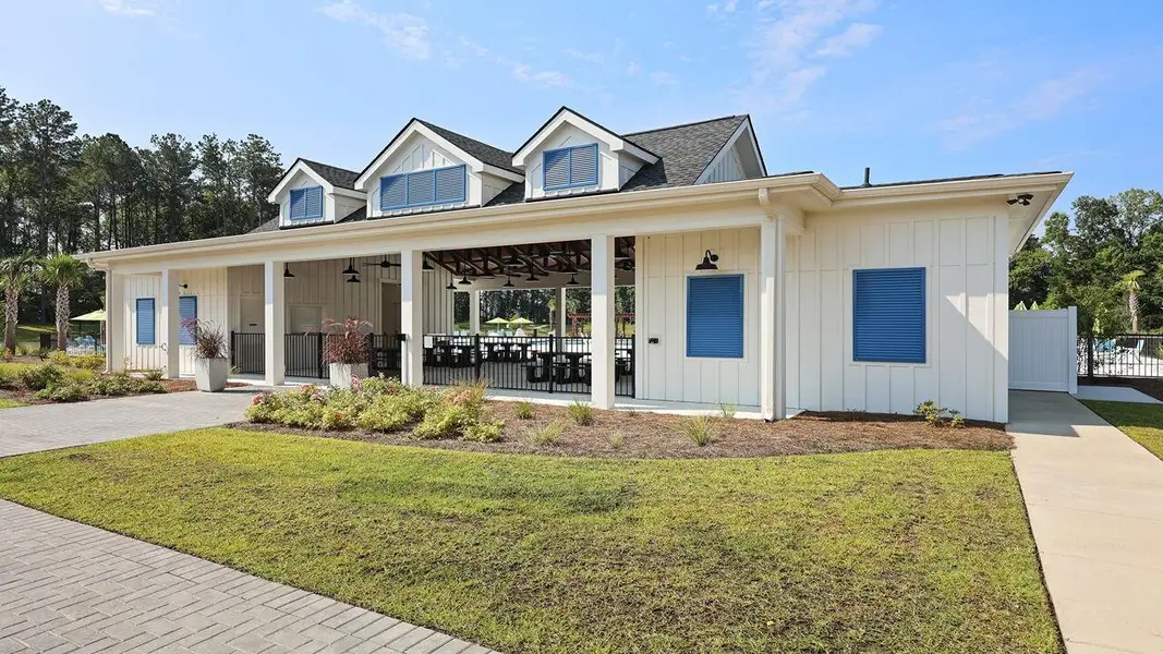 Front exterior of a new home in Carolina Groves, Moncks Corner, SC, highlighting curb appeal (Image 2). Front exterior of a new home in Carolina Groves, Moncks Corner, SC, highlighting curb appeal (Image 2).