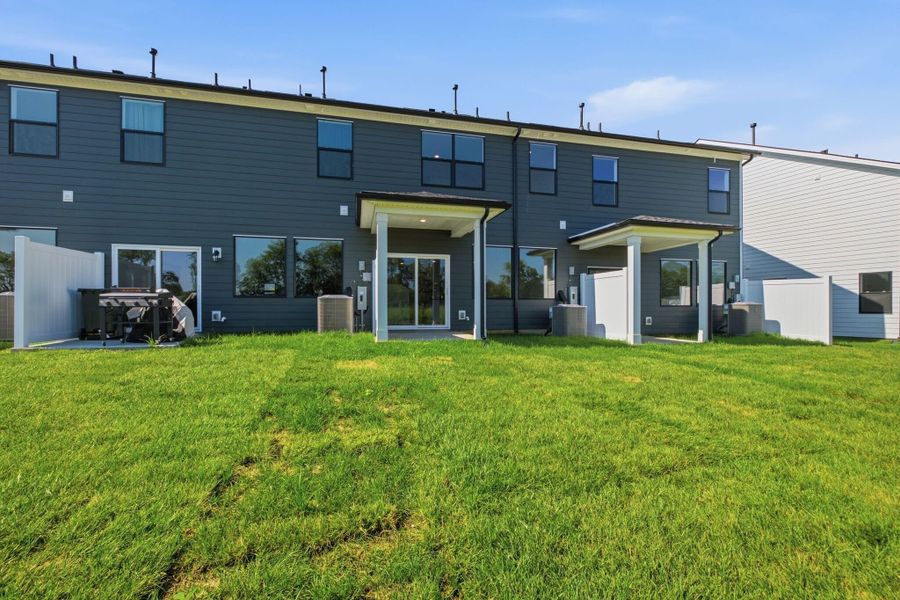 Exterior details and patio area of a home in Nexus Townhomes, Gallatin (Image 21).