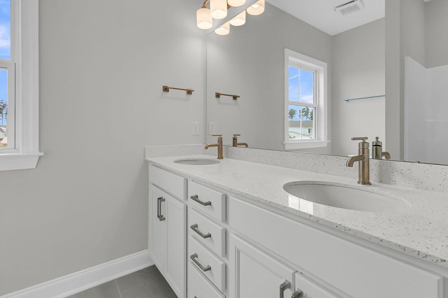 Furnished interior view inside a new home in Tidewater at Lakes of Cane Bay, Summerville (Image 7).