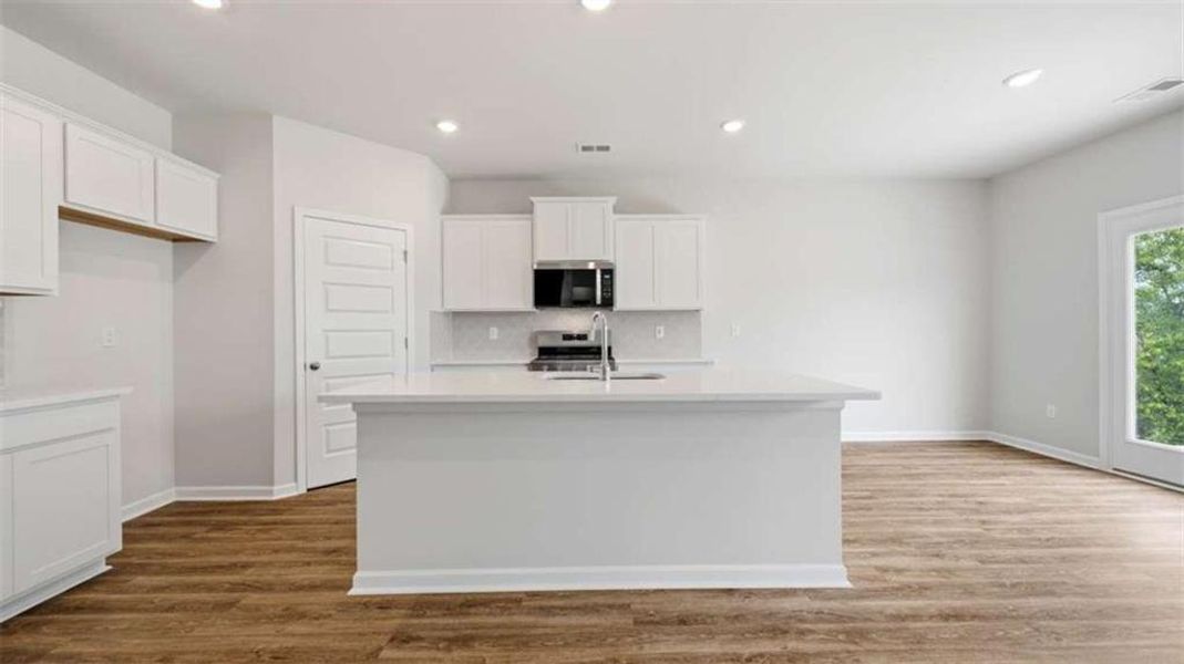 Furnished interior view inside a new home in Brooks Station, Dacula (Image 4).