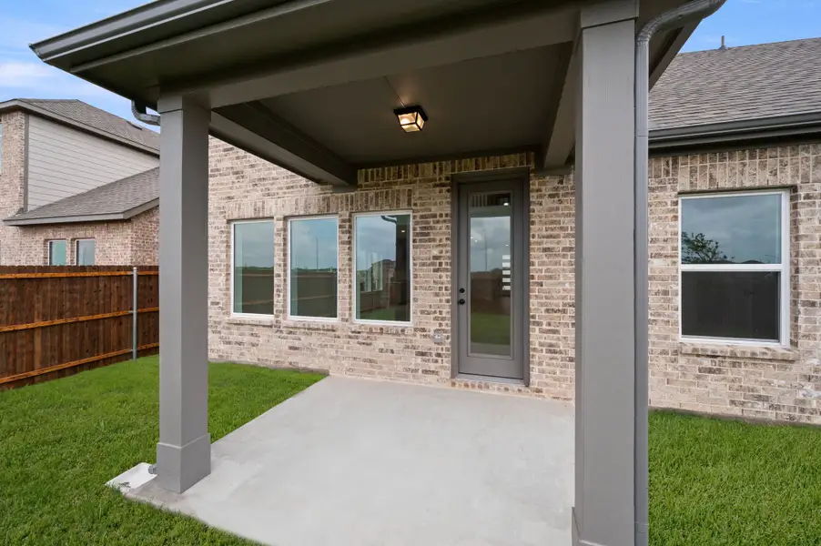 Exterior details and patio area of a home in Wildflower Ranch, Fort Worth (Image 1). Exterior details and patio area of a home in Wildflower Ranch, Fort Worth (Image 1).