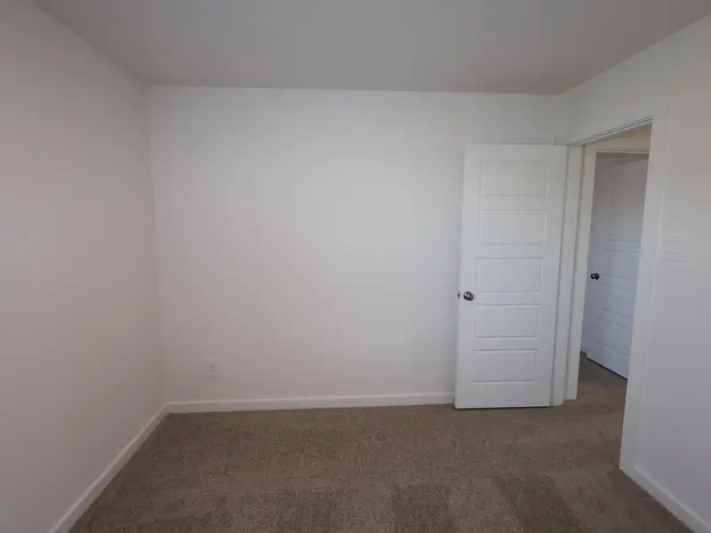 Spacious, unfurnished interior of a new home in Pinewood at Grand Texas, New Caney (Image 11).