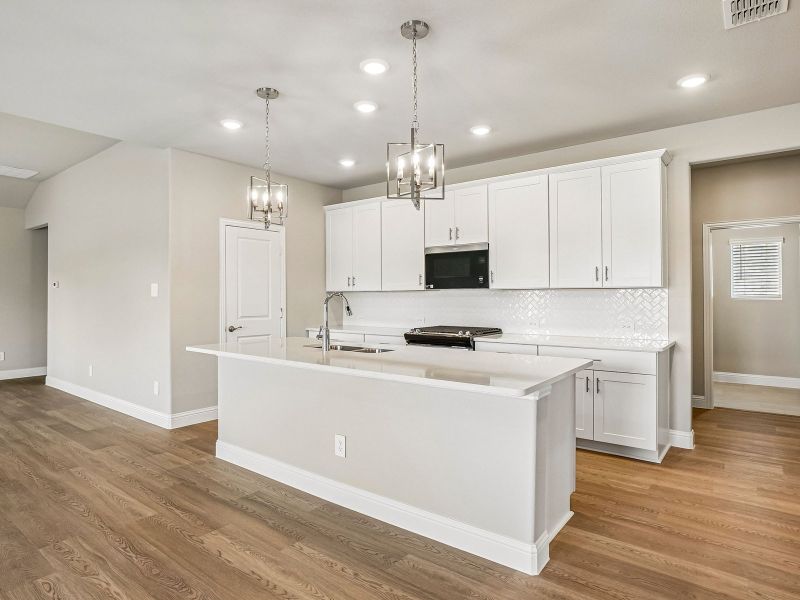 Furnished interior view inside a new home in Eastridge - Signature Series, Princeton (Image 6).