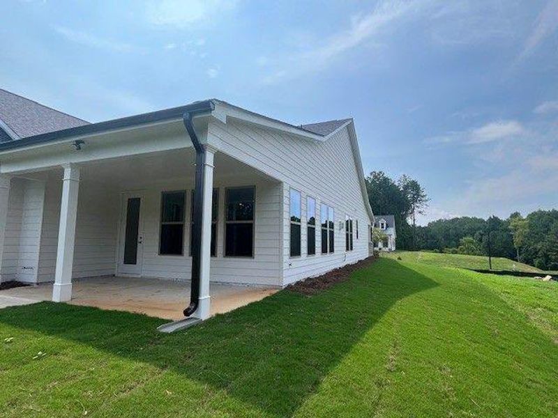 Exterior details and patio area of a home in Soleil Belmont Park, Canton (Image 3).