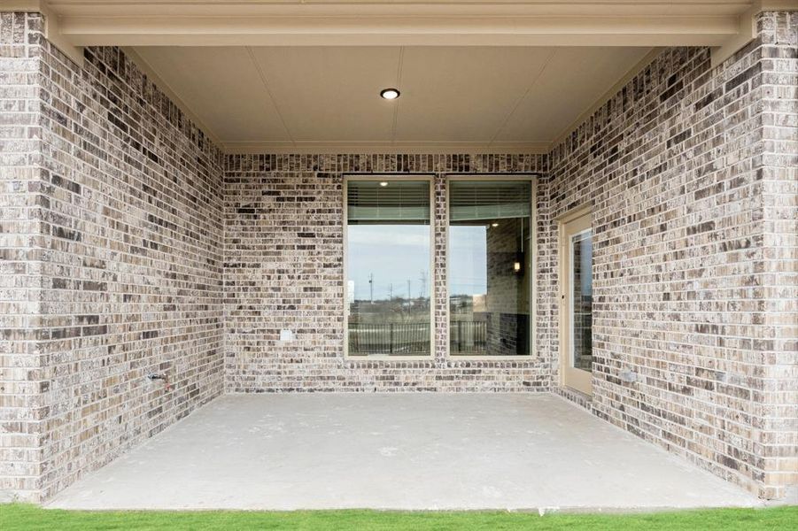 Exterior details and patio area of a home in Silo Mills, Joshua (Image 4).