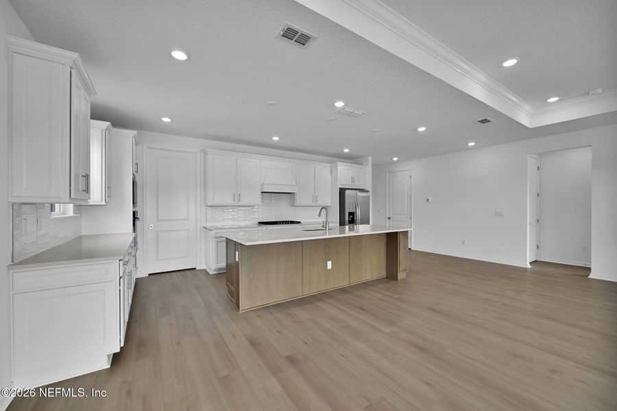 Furnished interior view inside a new home in Summer Bay at Grand Oaks, St. Augustine (Image 7).