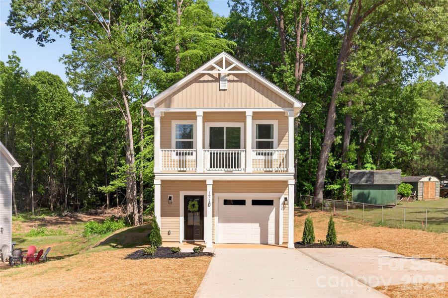 Front exterior of a new home in , Mooresville, NC, highlighting curb appeal (Image 25).