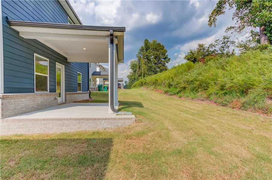 Front exterior of a new home in Sweetwater Green - Royal Series, Lawrenceville, GA, highlighting curb appeal (Image 25).