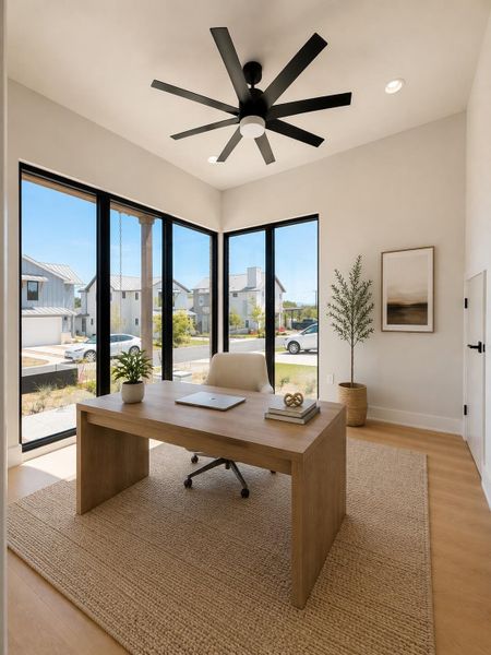 A well-lit study with full-height windows offers sweeping views of the neighborhood.
