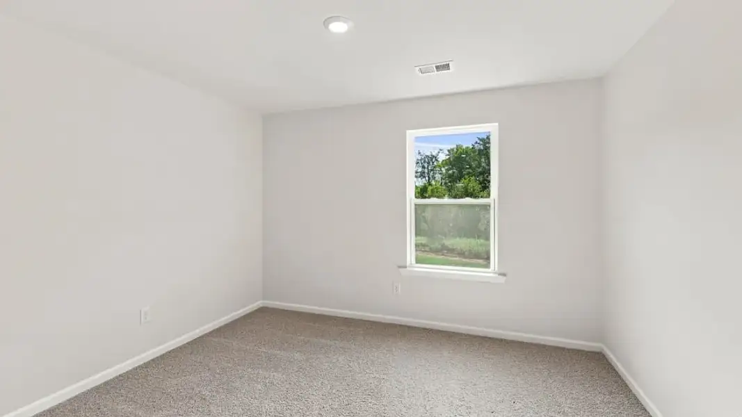 Spacious, unfurnished interior of a new home in Rocky River Ridge, Anderson (Image 21).