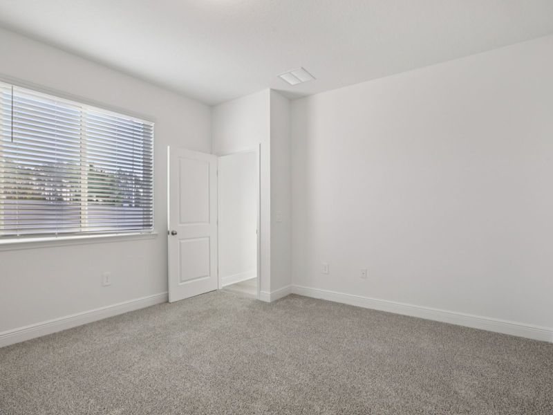 Spacious, unfurnished interior of a new home in Cyrene at Minneola - Villas, Minneola (Image 10). Spacious, unfurnished interior of a new home in Cyrene at Minneola - Villas, Minneola (Image 10).
