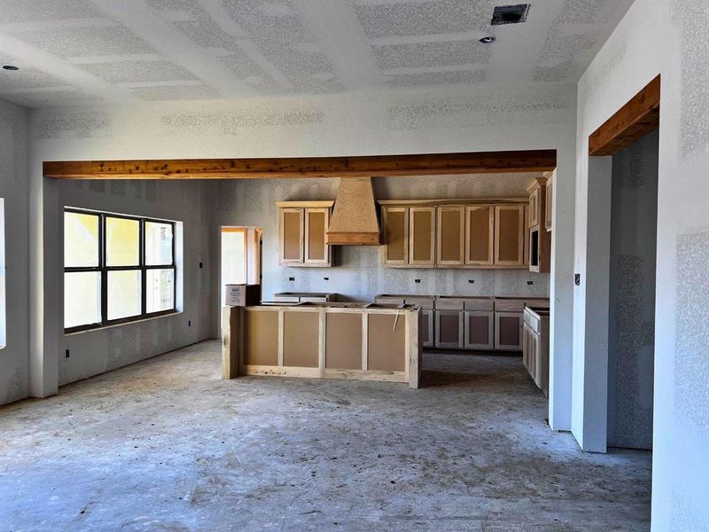 Kitchen that opens into living area