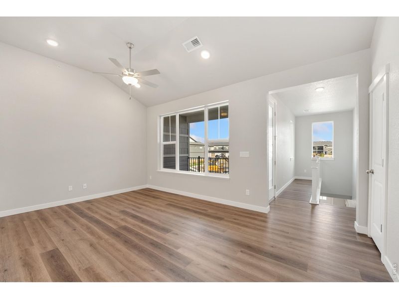 Spacious, unfurnished interior of a new home in The Lakes at Centerra - Discovery, Loveland (Image 20).