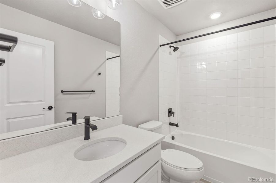 Furnished interior view inside a new home in Woodrose at Painted Prairie, Aurora (Image 25).