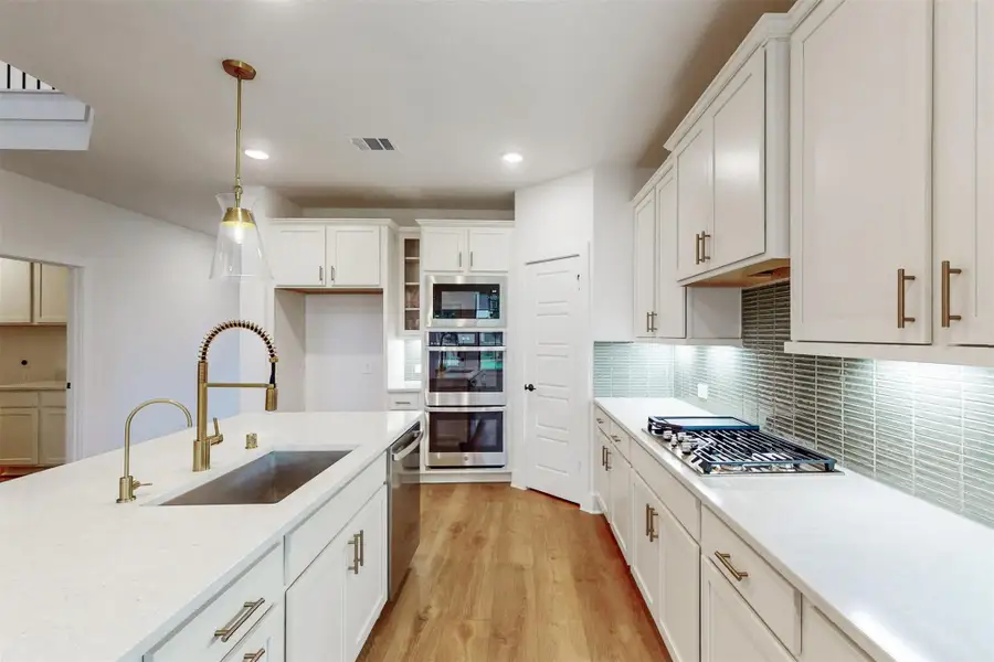 Furnished interior view inside a new home in Sorella, Tomball (Image 5).