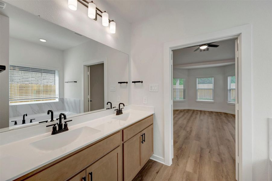 Furnished interior view inside a new home in Sorella, Tomball (Image 8).
